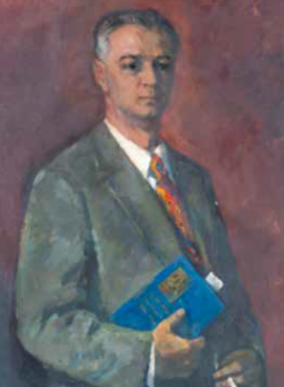 Elegáns férfi kék könyvvel Elegáns öltönyben lévő férfi, aki egy kék könyvet tart a kezében.