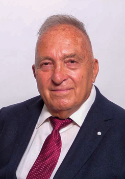 Elegáns öltöny és nyakkendő látható a képen.