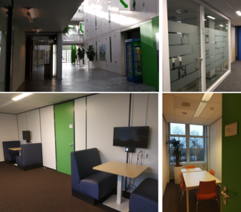 Modern irodai környezet különböző helyiségekkel Modern irodai környezet, zöld ajtókkal, üvegfalakkal, tárgyalókkal és növényekkel.